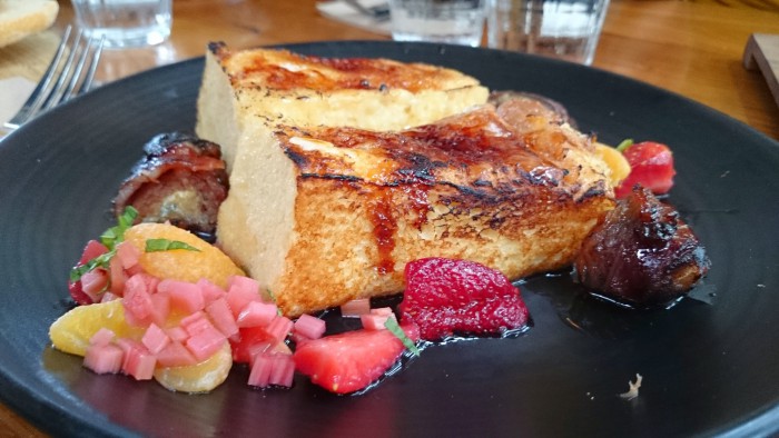 Brulee french toast with 'devil on horseback' dates, bacon and poached rhubarb
