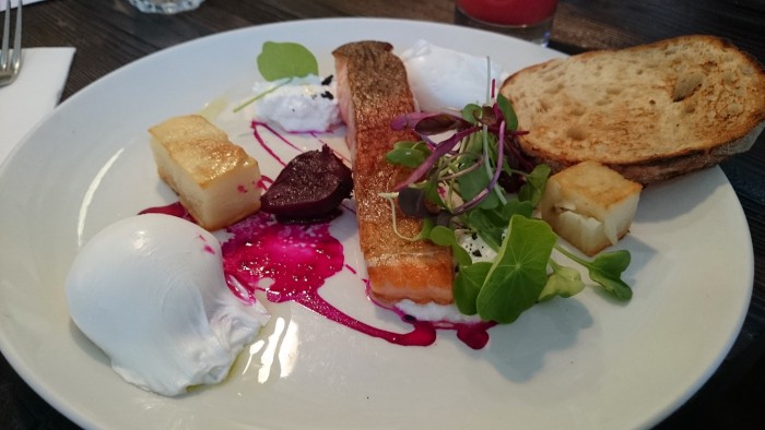 Gin and lime cured Huon ocean trout fillet with pickled baby beetroots, potato galette, poached eggs, leaves, goats curd & toast