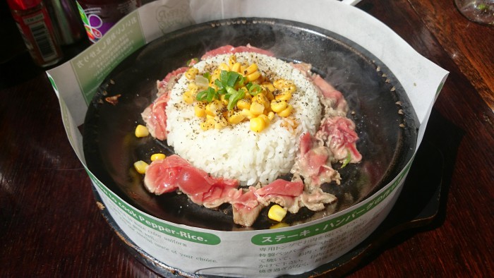 Pepper Beef - Seasoned rice and beef, cooked in front of you in the sizzling plate